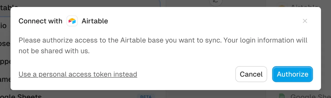 The Connect with Airtable dialog, with the personal access token link below the sign-in prompt
